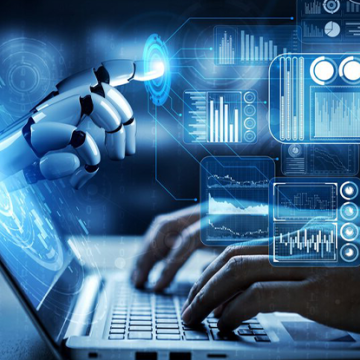 Image of human hand working with laptop with double exposure of AI artificial intelligence holograma and robot hand coming out of the screen of the laptop.