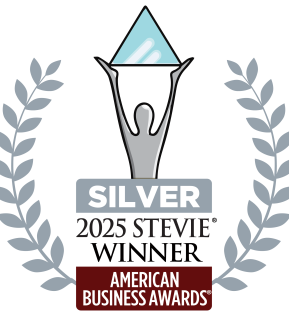 A logo of a person holding up an award for a silver stevie