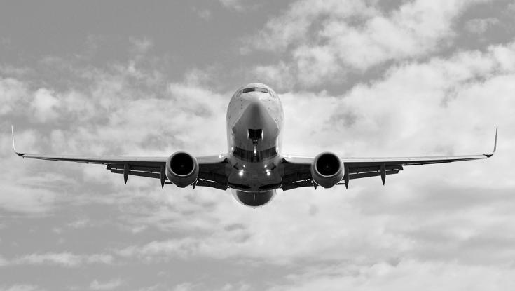 airplane flying in the clouds