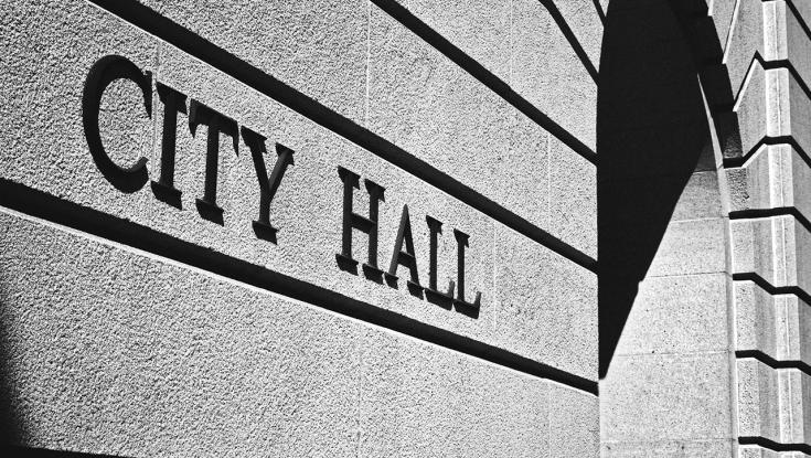 front of a city hall building