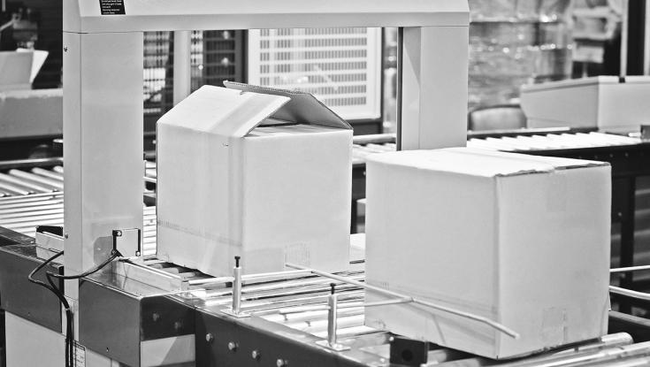 assembly line with boxes moving down it 