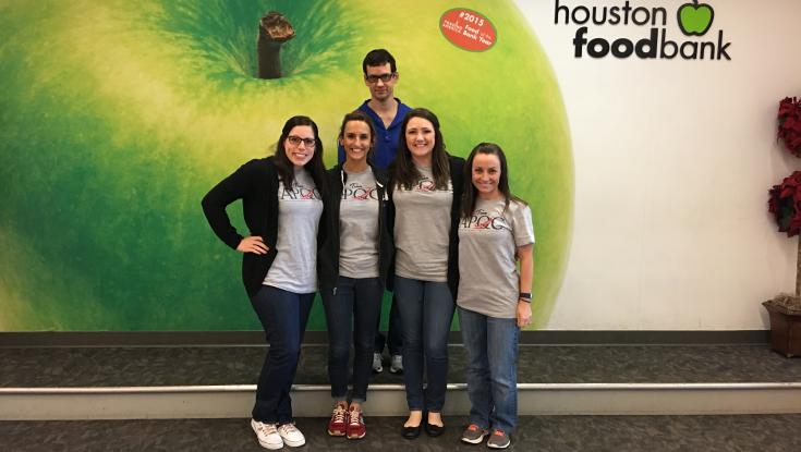 A picture of a group of employees volunteering at the Houston Food Bank