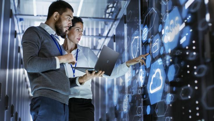 People looking at large technology platforms
