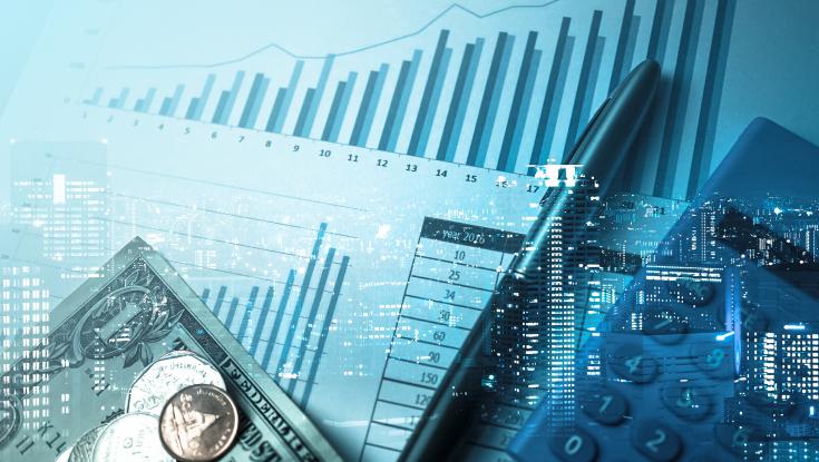 A picture of graphs and charts and money and a calculator