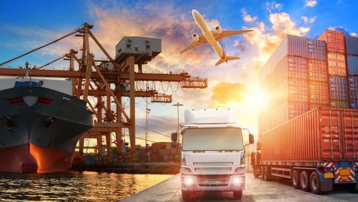 A picture of planes and trucks and barges hauling goods