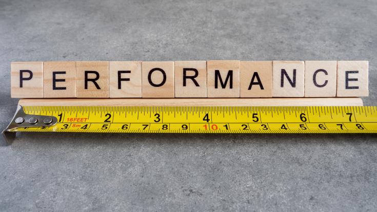 A ruler measuring the word performance