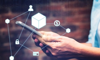 Supply Chain with a man holding a phone