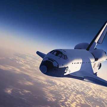 NASA space shuttle in orbit over the earth